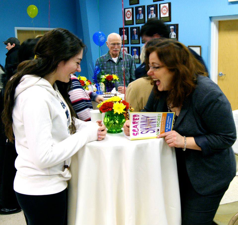 MD signing book for guest by Rich Pagano